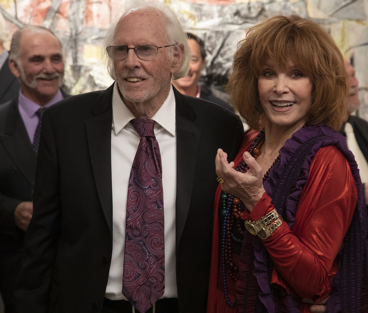 Richard (Bruce Dern) and Adaa Risi (Stefanie Powers) catch up over old times at his Manhattan art opening in THE ARTIST’S WIFE. Photo by Michael Lavine.