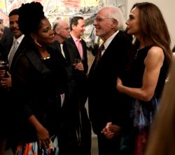 Liza (Tonya Pinkins) greets Richard (Bruce Dern) and Claire (Lena Olin) at his art opening at her gallery in THE ARTIST’S WIFE. Photo by Michael Lavine